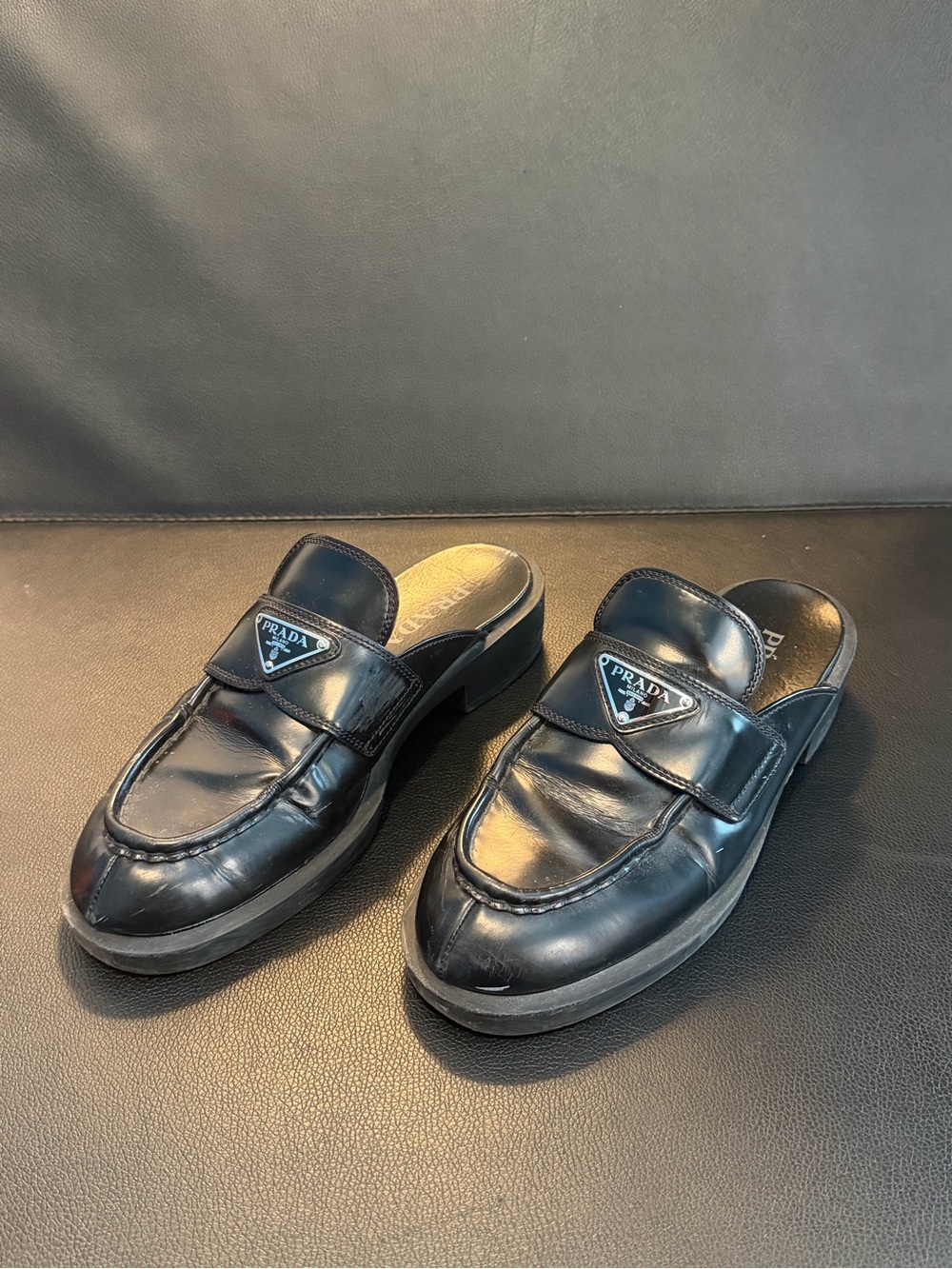 Prada Black Leather Slip-On Loafer Mules with Triangle Logo Plaque